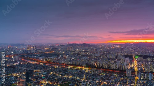 Time lapse 4k : Korea sunset of Seoul city view from Yongmasan mountain in South Korea. photo