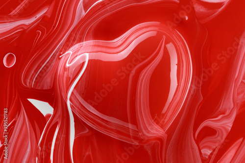 Red heart with white and red paint splashes 