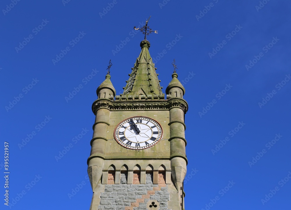 A Victorian  town clock  tower at the junction of Maengwyn Street and Penrallt Street in Machynlleth, Powys, Wales, UK.