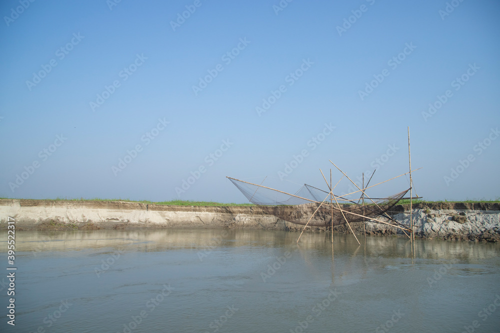 Traditional fishing net in the riverside