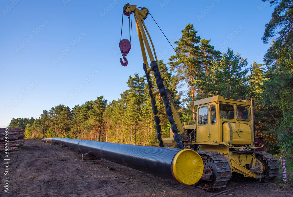 Crude oil and Natural gas pipeline construction work in forest area ...