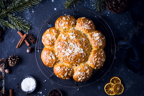 Swiss Three King's cake with sugar nibs and flaked almonds photo