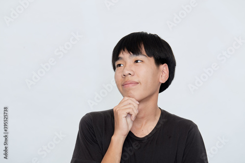 young Asian man making a confident