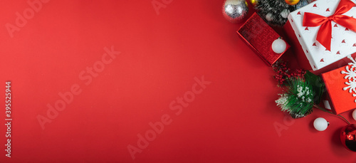 Top view new year and christmas composition on red background  banner with copy space