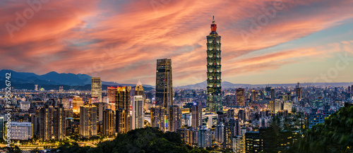 View from above, stunning view of the Taipei City skyline illuminated during a beautiful sunset. Panoramic view from the Mount Elephant in Taipei, Taiwan. © Travel Wild