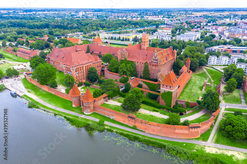 Malbork town and medieval german castle called Marienburg. Bird view. Summer time. Aerial view. Poland
