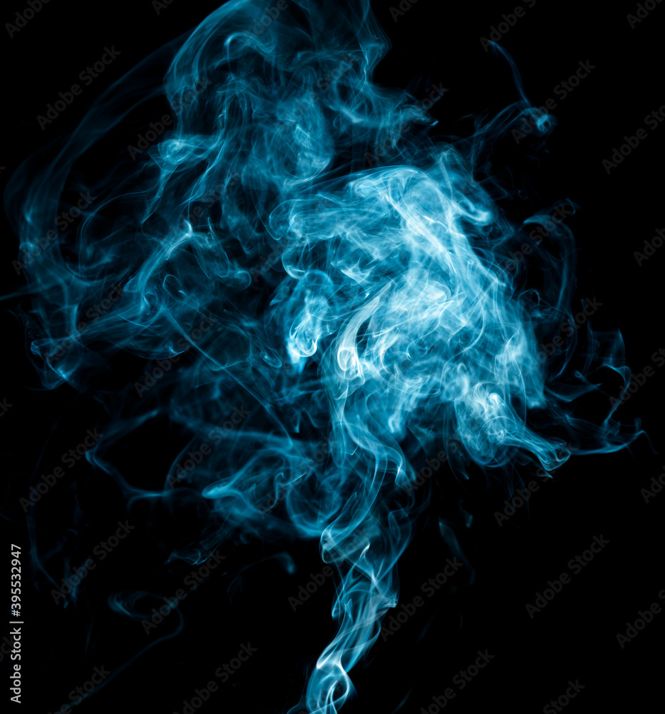 Obraz premium Blue smoke isolated on black background.