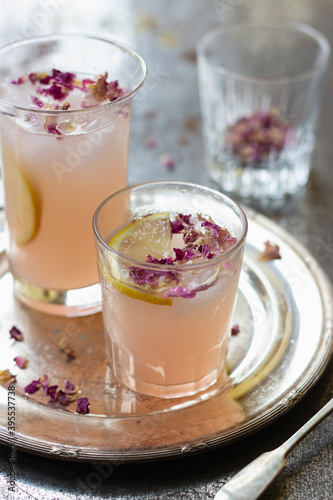 Rhubarb sharbat with rose water and rose petals photo