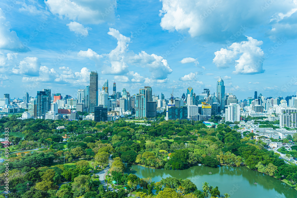Beautiful landscape of cityscape with city building around lumpini park in bangkok