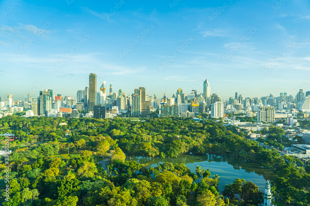 Beautiful landscape of cityscape with city building around lumpini park in bangkok