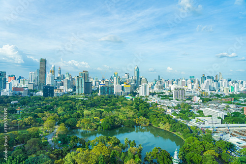 Photography Beautiful landscape of cityscape with city building around lumpini park in bangk