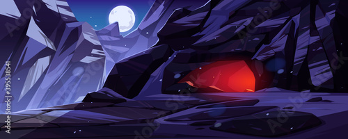 Mountains with entrance to cave lit from within at night. Vector cartoon winter landscape with rocks, snow, moon in sky and deep stone cavern with light inside