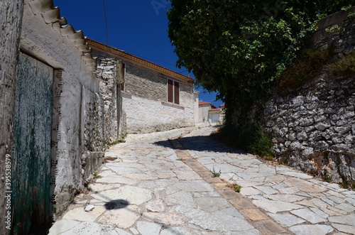 Cobblestone street with stone houses in a remote village on Zakynthos island, Greece