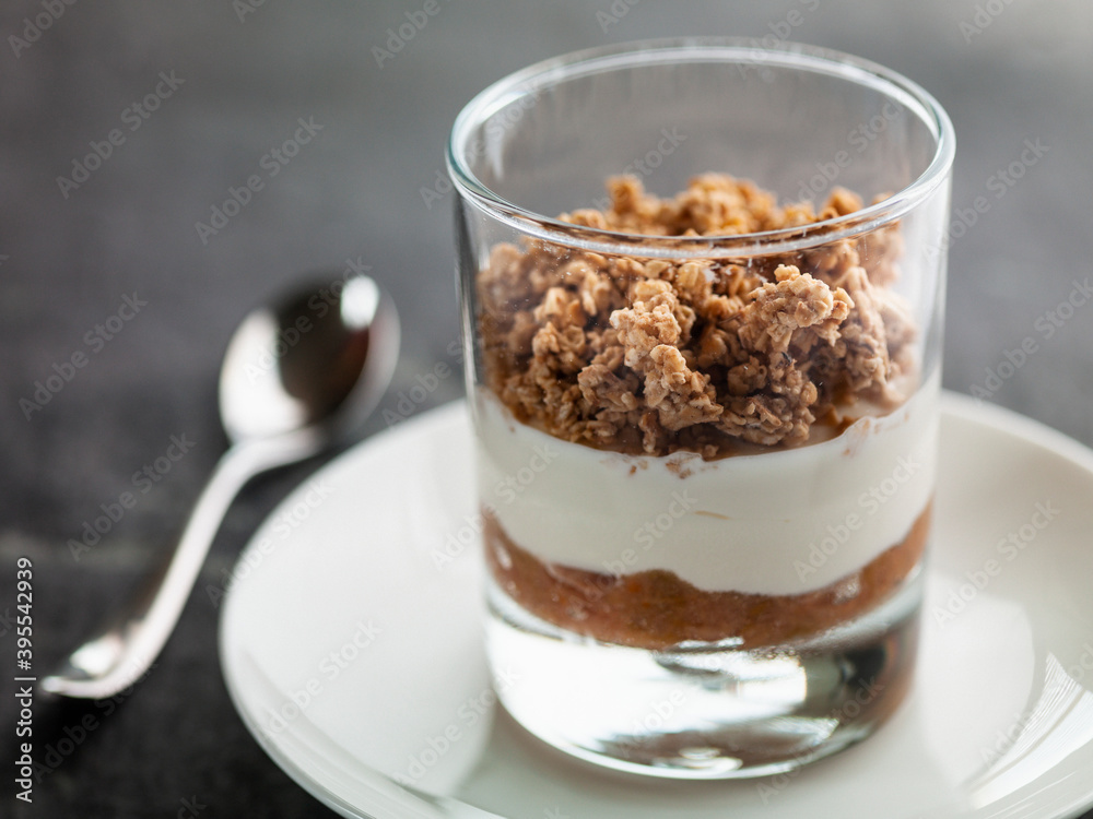 Granola muesli with yogurt and rhubarb puree Granola muesli with yogurt and rhubarb puree