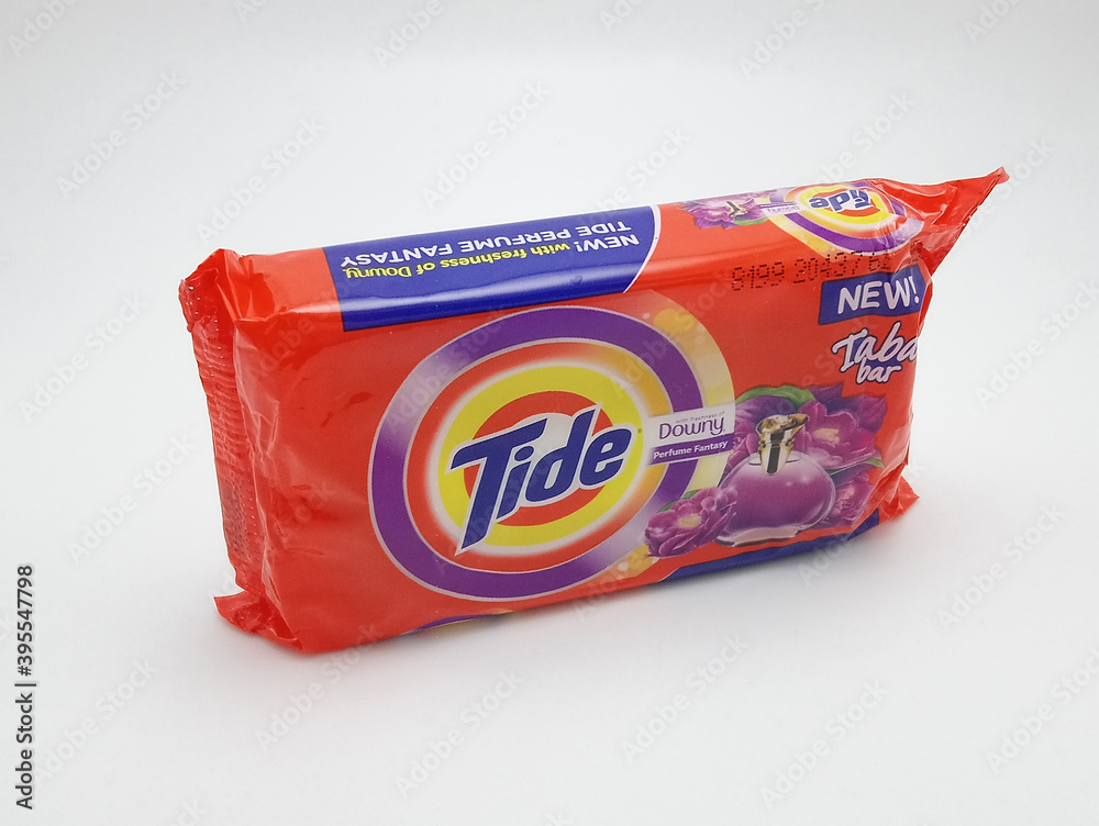 Tide laundry bar soap with downy perfume fantasy fabric conditioner in