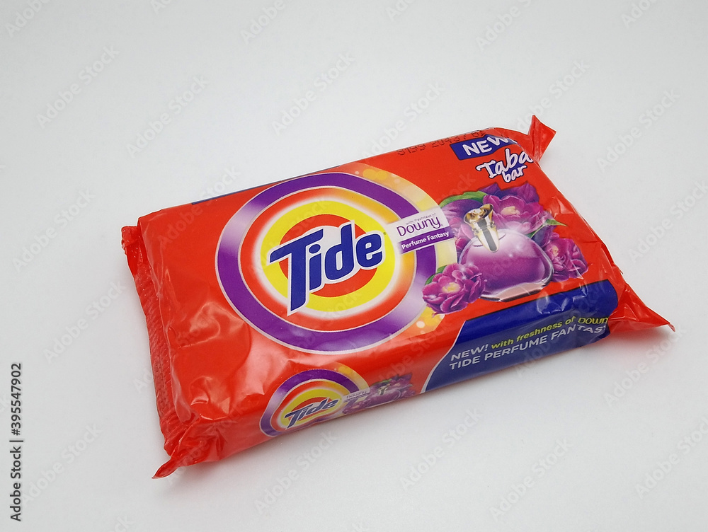 Tide laundry bar soap with downy perfume fantasy fabric conditioner in