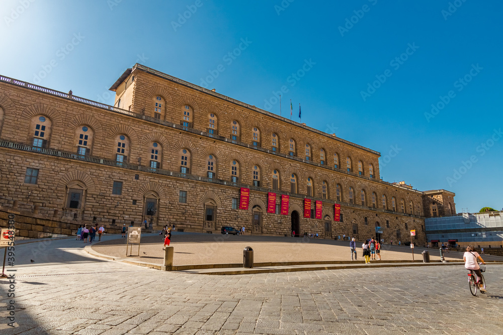 Obraz premium Perfect view of Palazzo Pitti, a vast, mainly Renaissance palace and toady the largest museum complex in Florence, Italy. The rusticated stonework gives the palace a severe and powerful atmosphere.