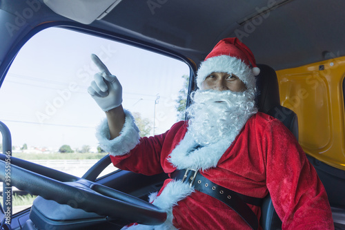 Truck driver wearing Santa Claus on Christmas © Nuad Contributor