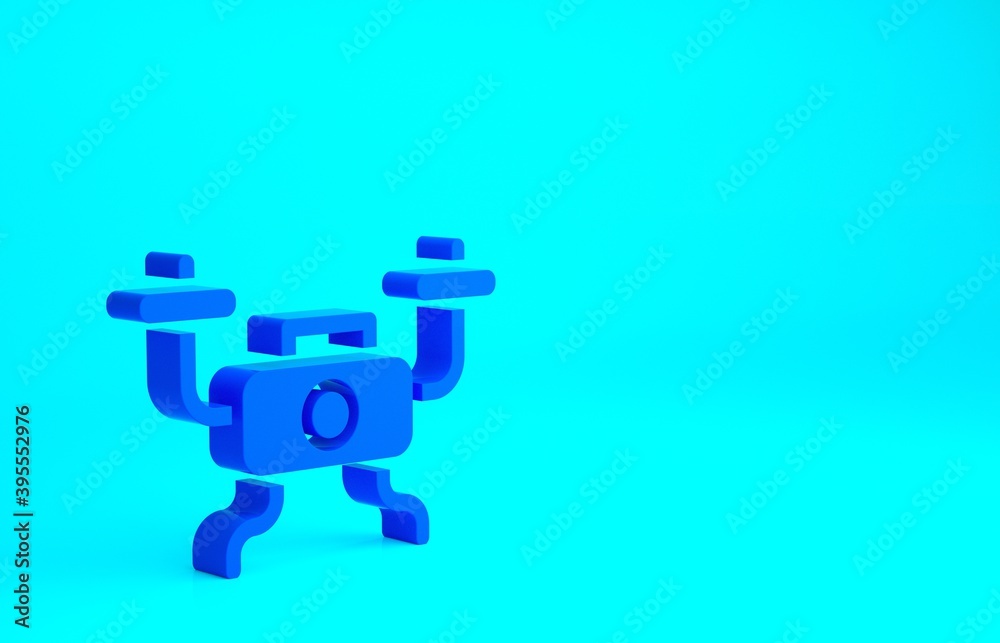 Blue Drone flying icon isolated on blue background. Quadrocopter with video and photo camera symbol. Minimalism concept. 3d illustration 3D render. Blue Drone flying icon isolated on blue background. Quadrocopter with video and photo camera symbol. Minimalism concept. 3d illustration 3D render.