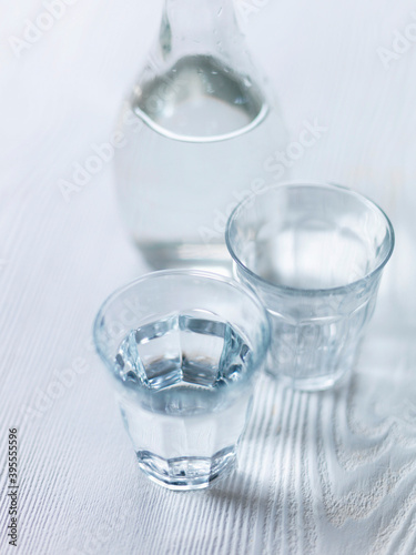 Water glasses on white wood