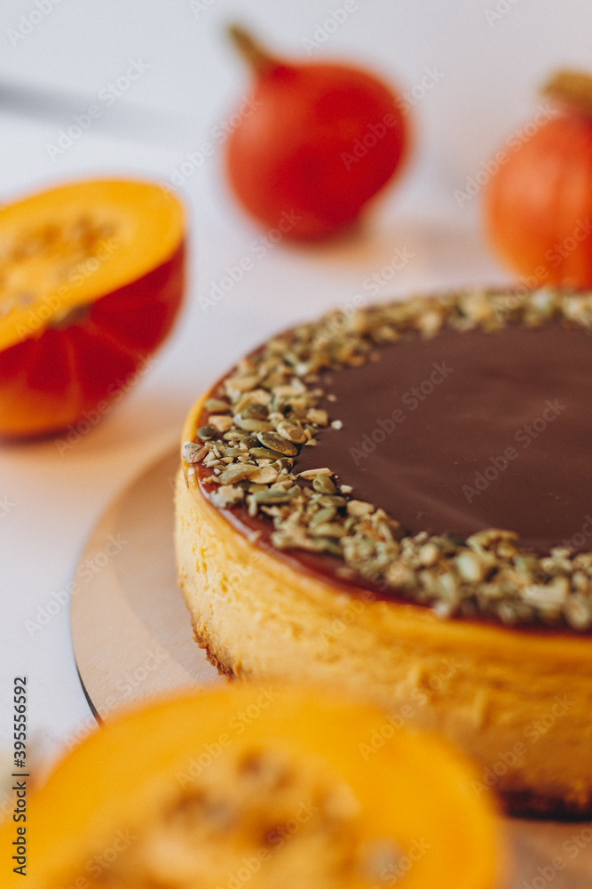 delicious pumpkin cheesecake decorated with pumpkin seeds