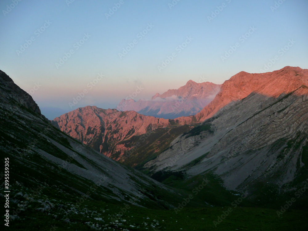 Sunset at mountain crossing Ammergau Alps