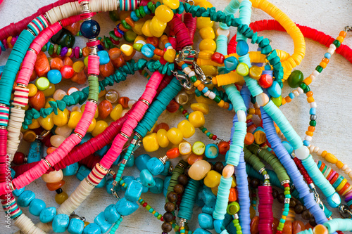 Jewelry background, colorful necklaces, large group of beads and stone necklace