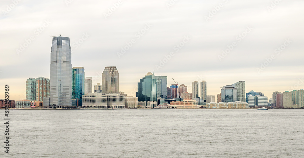 Panoramic View of Jersey City Skyline, New Jersey, USA. Futuristic Buildings and Towers Along the Coast