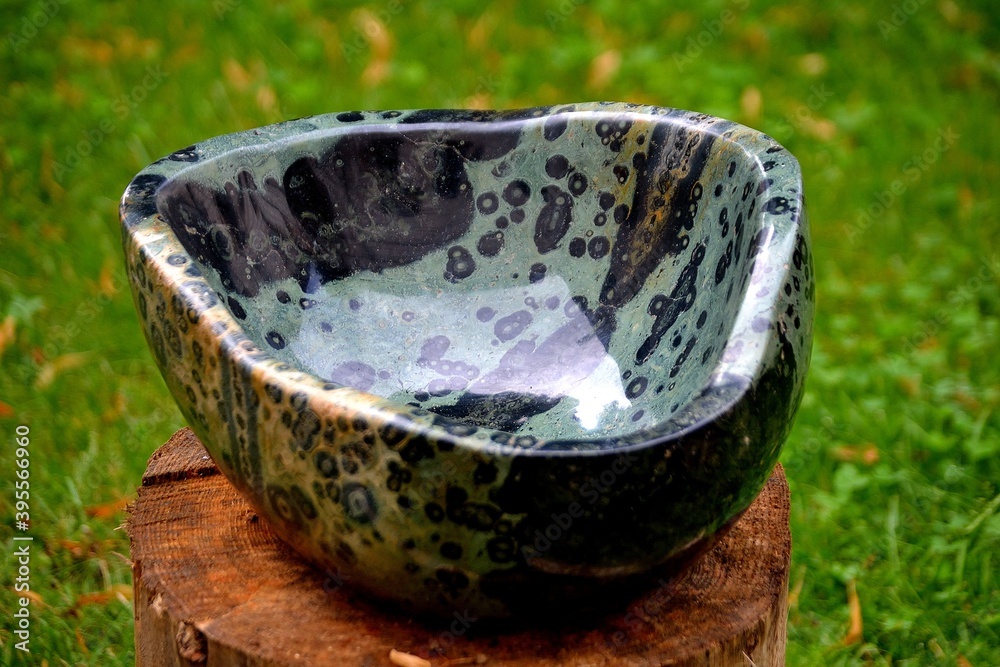picture A beautifully worked and polished mineral in the shape of a bowl, Czech Republic