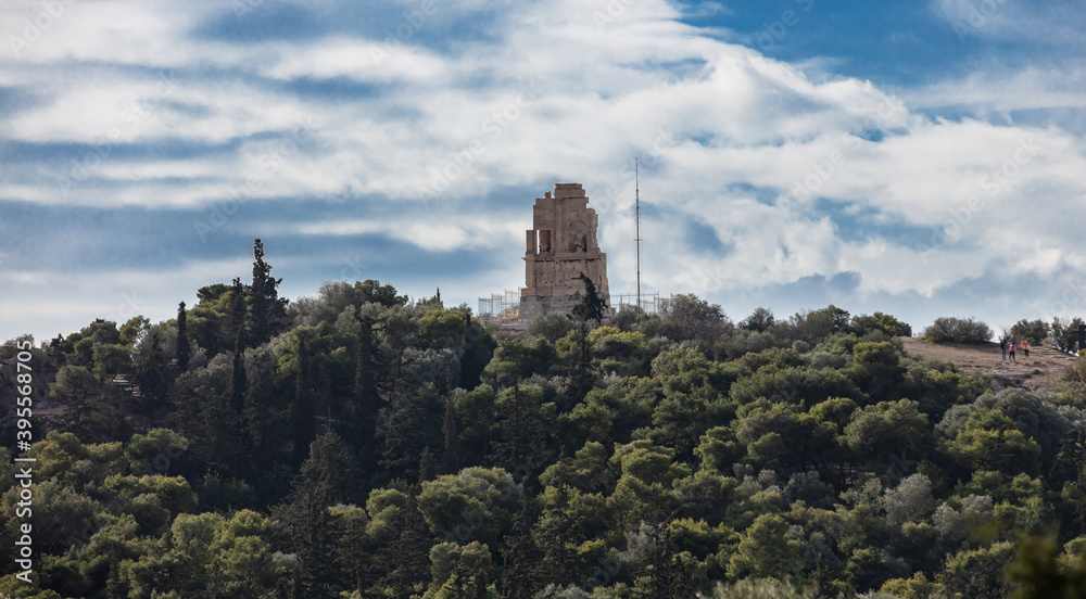 Philopappos Monument, blue sky background. Athens, Greece,