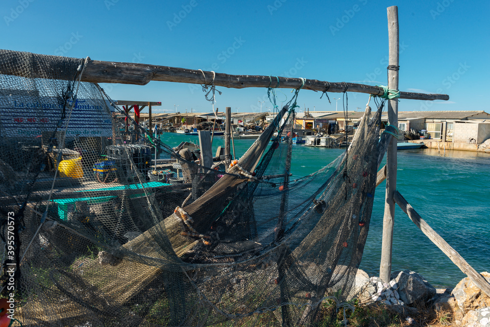 Fishing nets and boats in the harbour at Leucate South of France