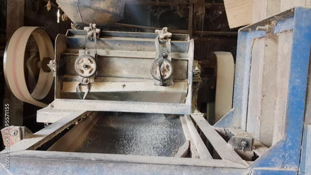 The machine of the rice mill is working. The machine of the rice mill is working.