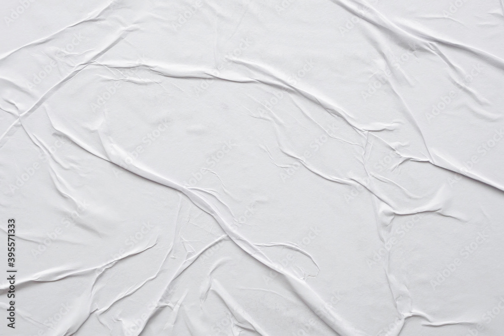Obraz premium Blank white crumpled and creased paper poster texture background