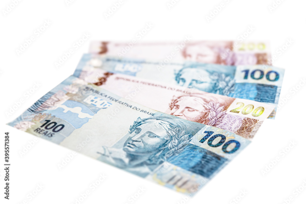 one hundred and two hundred reais bills, money from Brazil. Payment and credit, profit or wealth concept one hundred and two hundred reais bills, money from Brazil. Payment and credit, profit or wealth concept