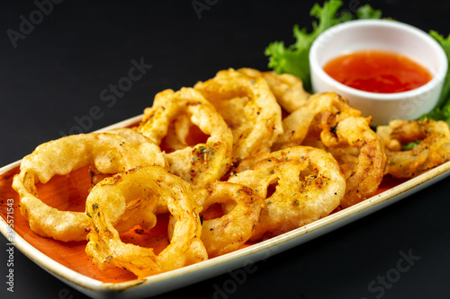 Fried calamari rings in restaurant