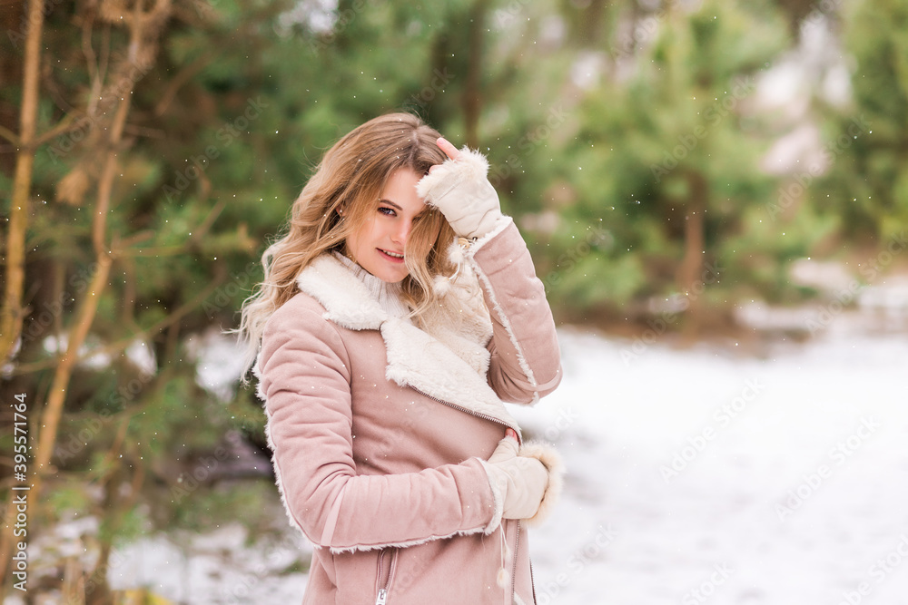 portrait beautiful girl in the winter outdoors. portrait beautiful girl in the winter outdoors.