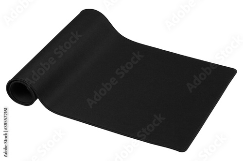 Fotografi Big black fabric gaming mouse pad in roll on white background