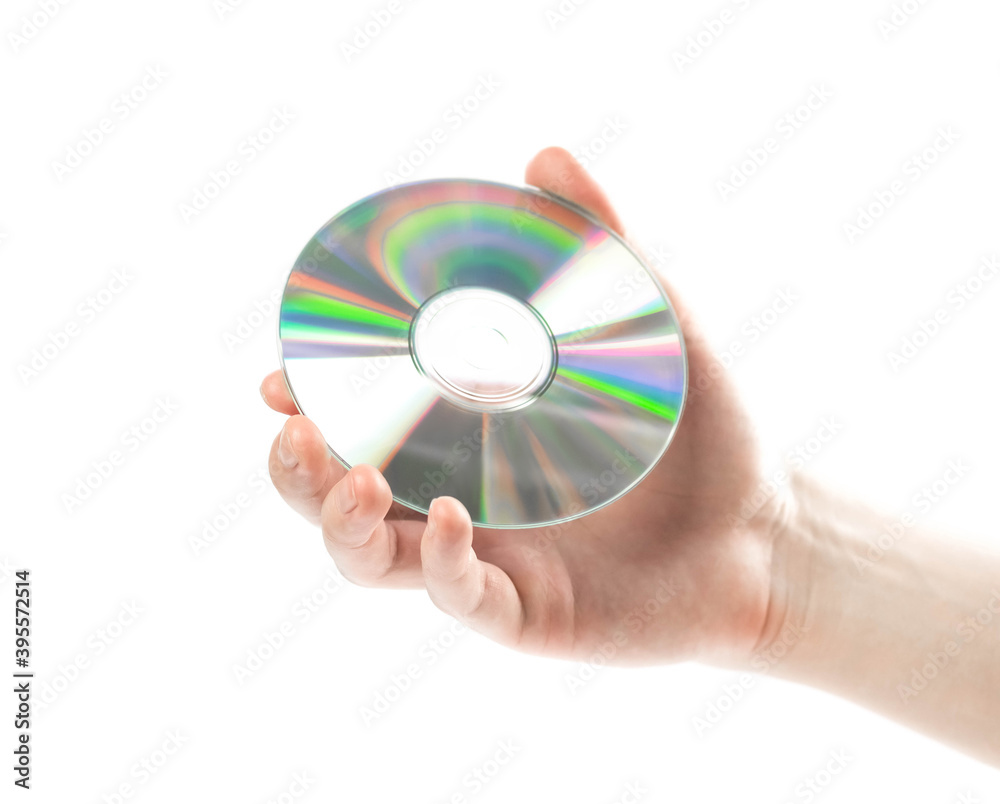 Hand holding a CD. Close up. Isolated on a white background Hand holding a CD. Close up. Isolated on a white background