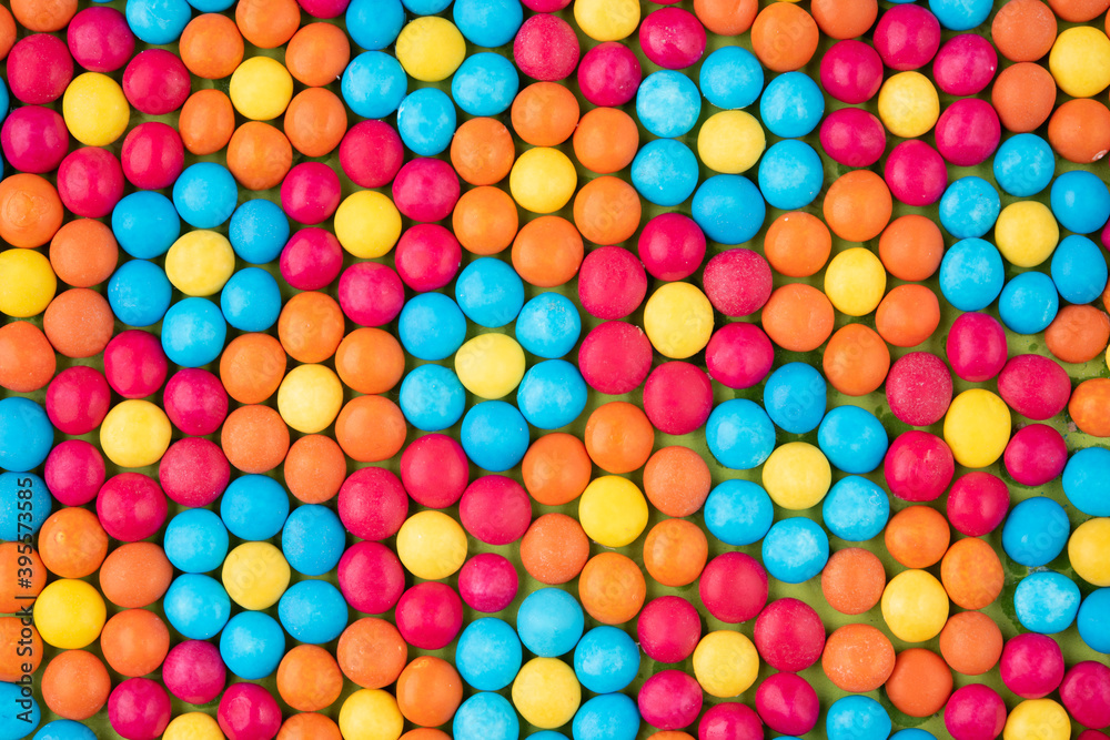 background of blue caramel and chocolate toppings background of blue caramel and chocolate toppings