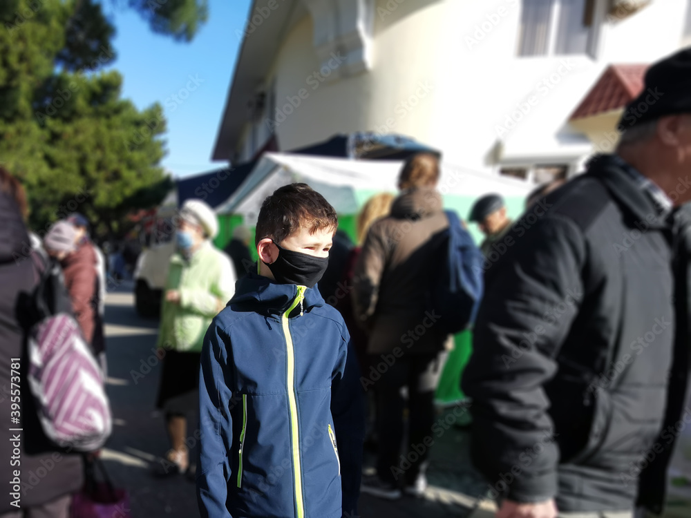 A boy in a mask against viruses an epidemic of coronavirus or viruses among people