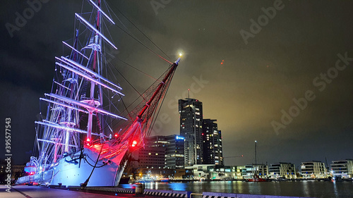 Polish sailing ship SV Dar Pomorza by night at the waterfront in Gdynia, Poland
