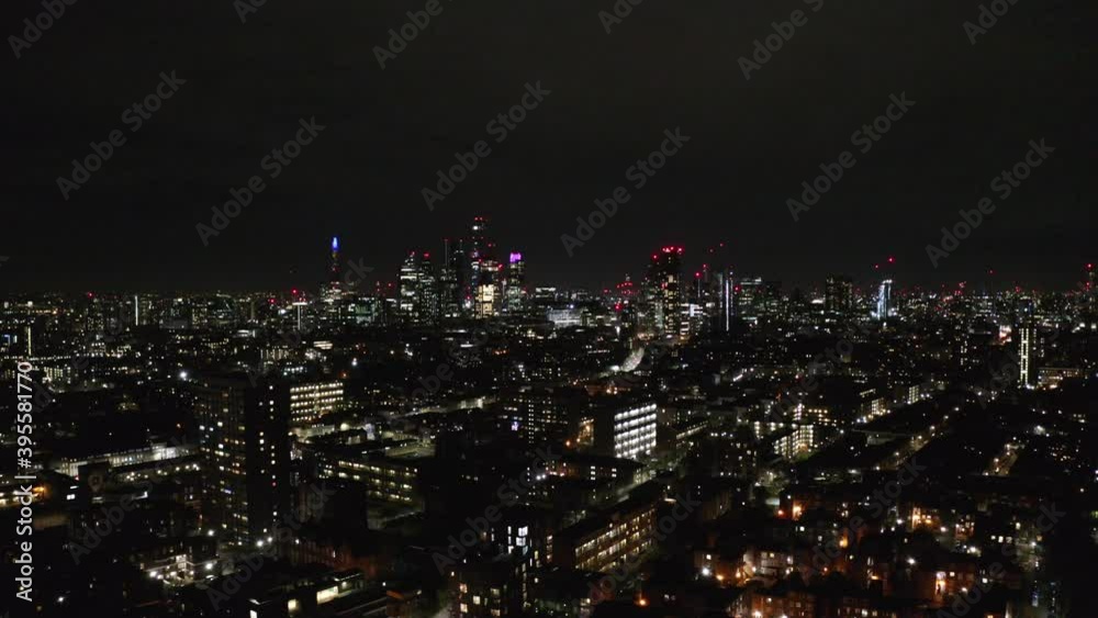 Dolly forward night drone shot of London City skyscrapers skyline Dolly forward night drone shot of London City skyscrapers skyline