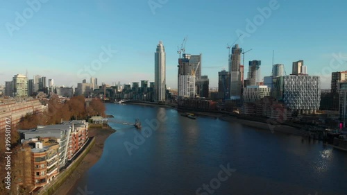 Wallpaper Mural Falling drone shot over Thames river towards The Tower Vauxhall London Torontodigital.ca