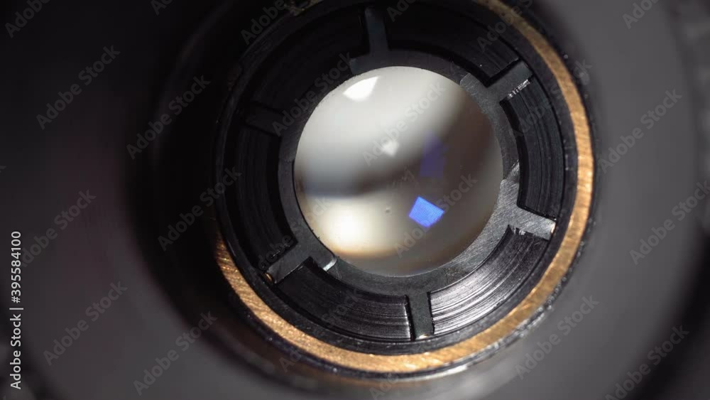 Open aperture objective close-up. Media and technology concept background. Macro shot. selective focus