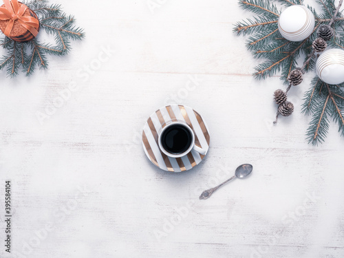 Christmas coffee mug top view, Christmas decorations, baubles and Christmas tree twigs
