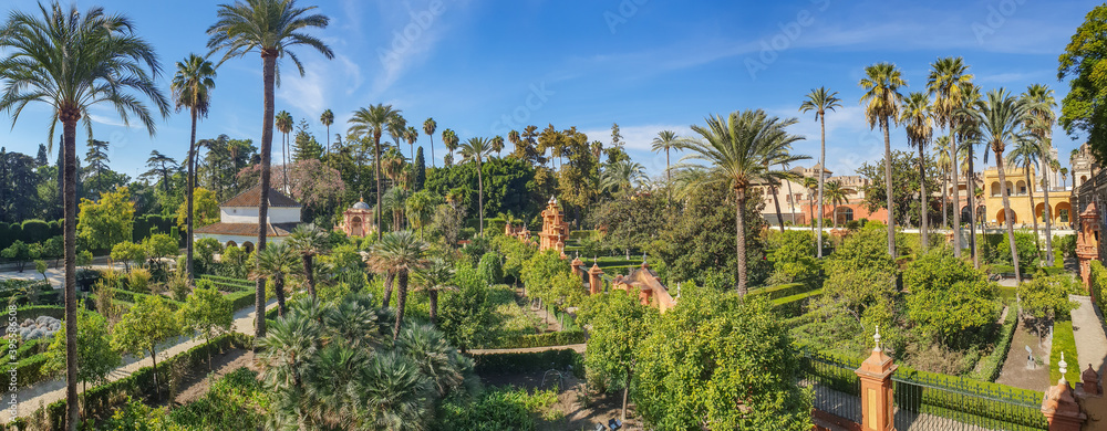 Fototapeta premium Garden in historical Reales Alcazares in Seville, Andalusia, Spain