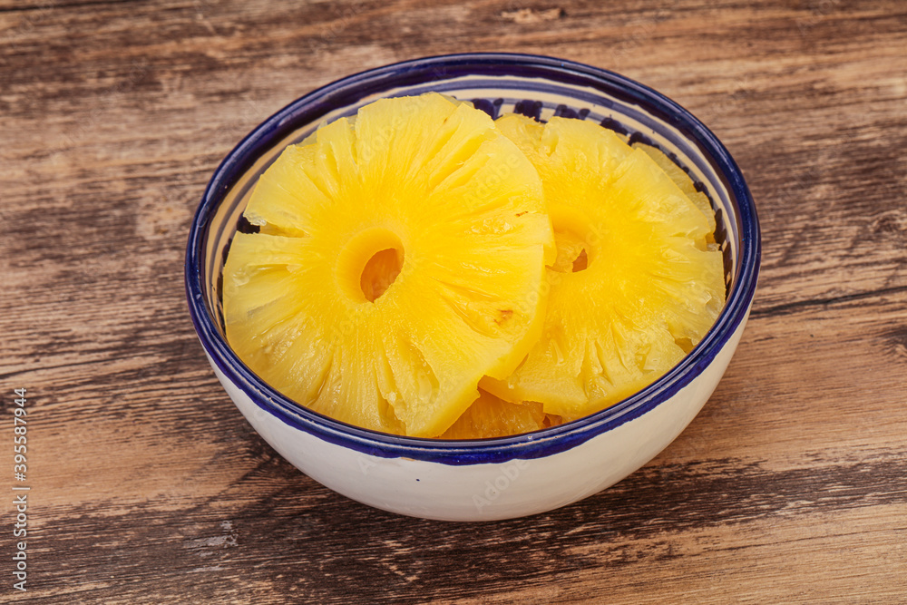 Marinated pineapple rings in the bowl Marinated pineapple rings in the bowl