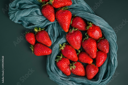 Canvas Print Red strawberries beautifully laid out on a thin gauze cloth