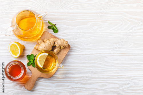 Ginger and lemon tea with fresh mint - homemade natural remedy against flu, cold and cough