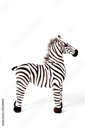 Zebra doll made from fabric is stand alone isolated on white background.